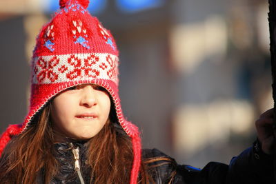 Portrait of girl in park during winter