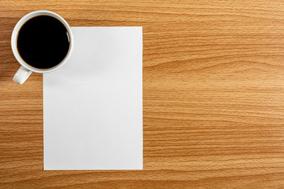 Directly above shot of coffee cup on table