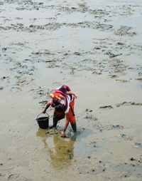 Full length of boy on beach