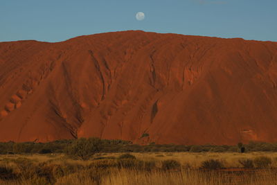 Scenic view of desert against clear sky