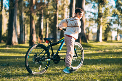 Portrait of child with a bicycle