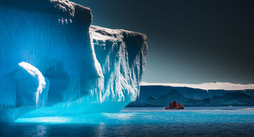 Panoramic view of frozen sea against clear sky