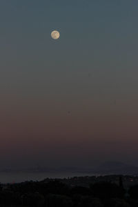 Scenic view of moon at sunset