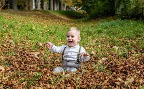 Little boy smiling in nature