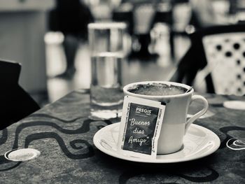 Close-up of coffee cup on table