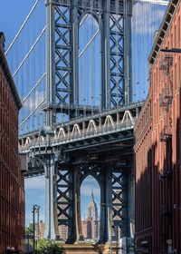 View of suspension bridge in city