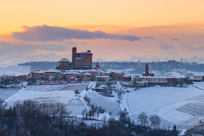 Buildings against sky during winter