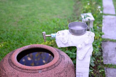 Close-up of fire hydrant on field