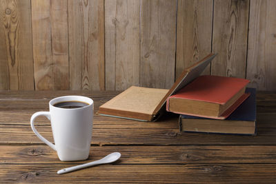 High angle view of coffee cup on table