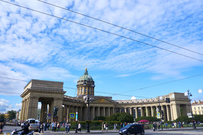 Low angle view of historical building against cloudy sky