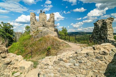 Stone wall against sky