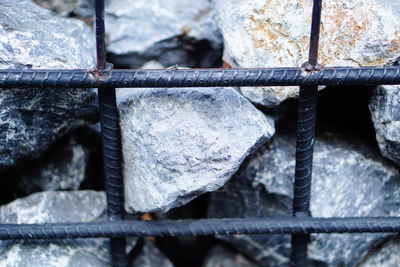 Close-up of snow on metal railing