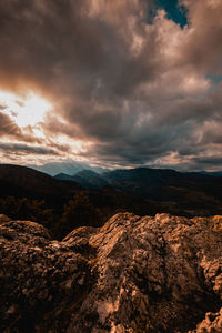 Scenic view of mountains against sky during sunset