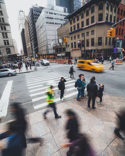 People walking on city street