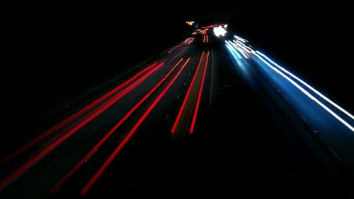 Light trails on road at night