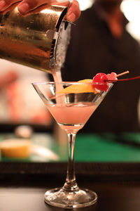 Close-up of wineglass on table