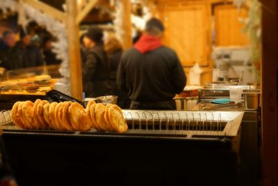 Close-up of man preparing food