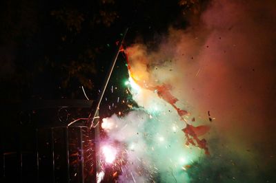 Firework display at night