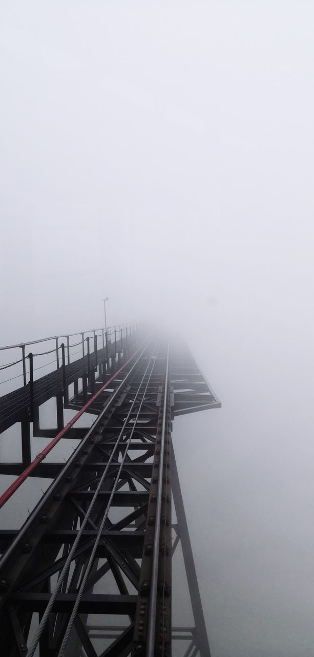 fog, sky, transportation, nature, water, no people, architecture, built structure, copy space, bridge, connection, outdoors, day, bridge - man made structure, sea, pier, cold temperature, beauty in nature