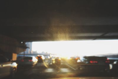 Close-up of cars on road in city at night