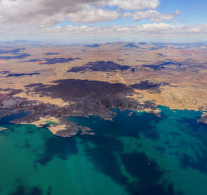 Aerial view of clouds over mountain