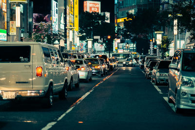 Traffic on city street at night