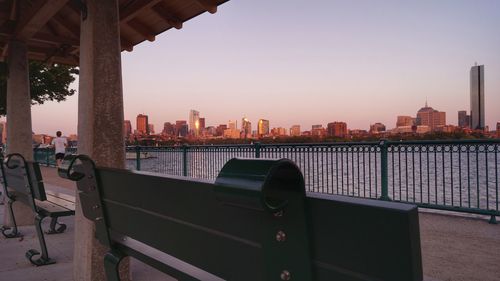 View of city buildings against clear sky