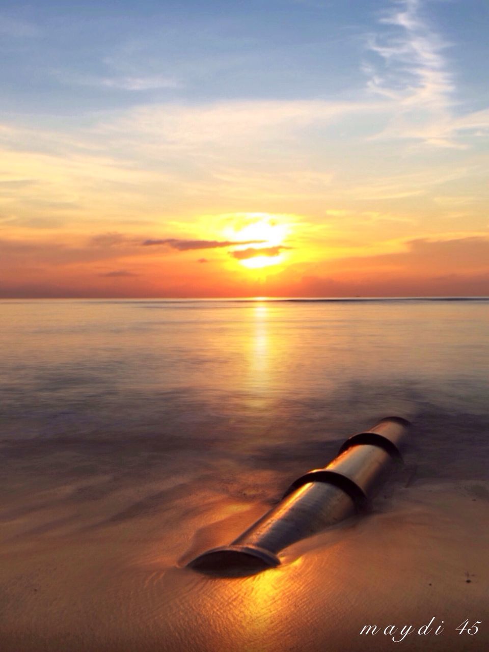 sunset, sea, horizon over water, sky, scenics, water, orange color, beauty in nature, tranquil scene, tranquility, beach, cloud - sky, nature, sun, idyllic, shore, cloud, reflection, sunlight, outdoors