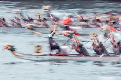 Group of people enjoying in water