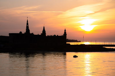 Kronborg castle silhouette in helsingor at sunset, denmark. castle on the shore in helsingor. 