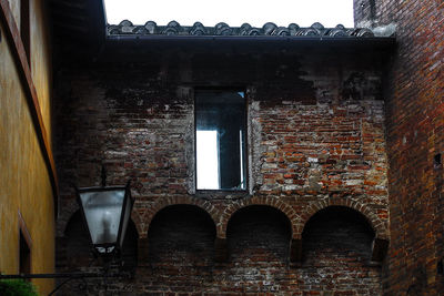 Illuminated building in city