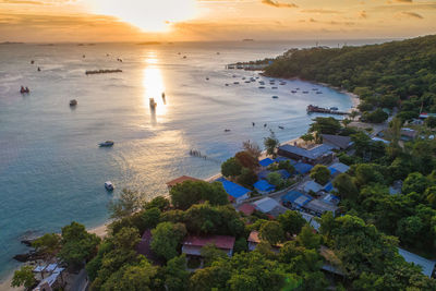 High angle view of beach against sky during sunset