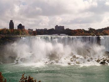 Scenic view of river flowing through rocks