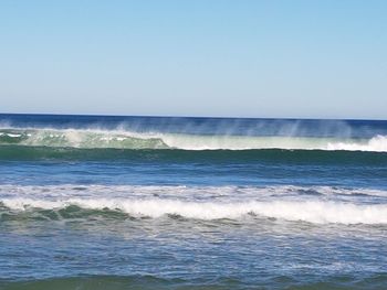 Scenic view of sea against clear sky