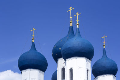 Low angle view of building against blue sky