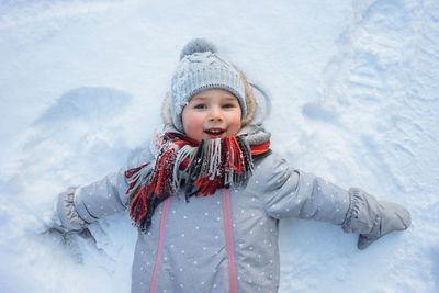 Portrait of cute girl in snow
