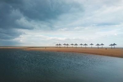 Scenic view of beach against sky