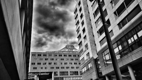 Low angle view of modern buildings against sky