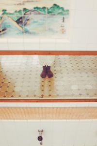 Close-up of figurine hanging on table
