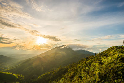 Scenic view of mountains against sky during sunset