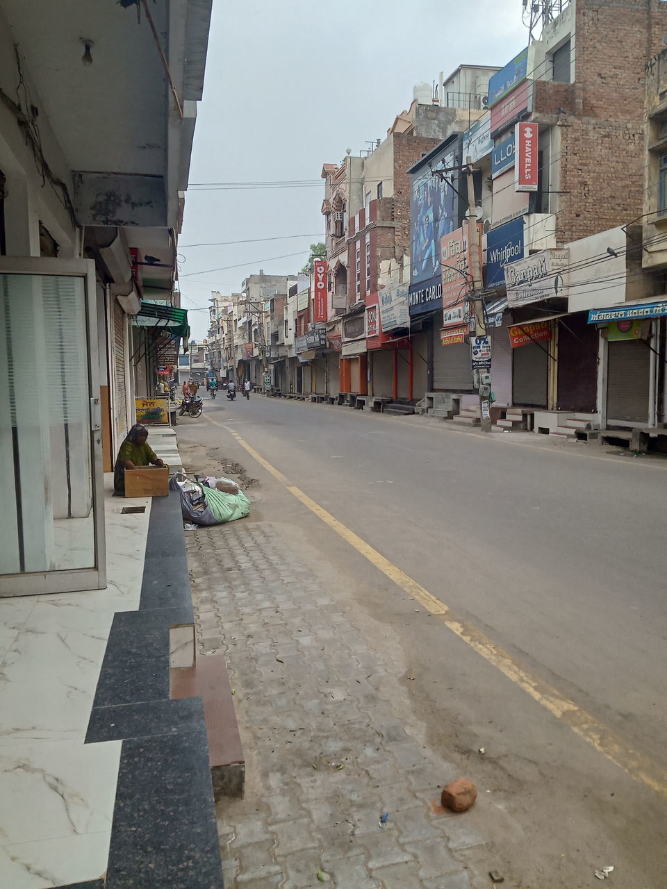 STREET AMIDST BUILDINGS IN CITY