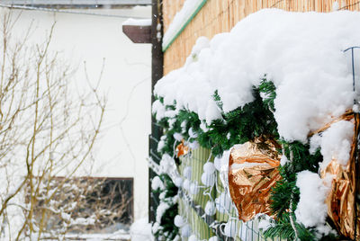 Close-up of snow covered house