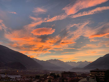 Scenic view of townscape against sky during sunset