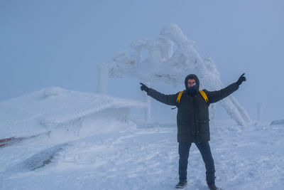 Full length of a man skiing on snow.
hiking to the top of vitosha mountain in winter is so special. 