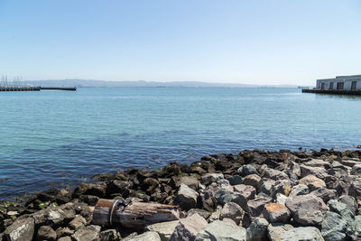 Scenic view of sea against clear sky