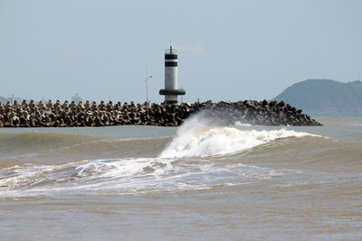 Waves splashing on shore