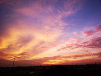 Scenic view of dramatic sky during sunset