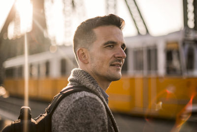 Portrait of young man looking away