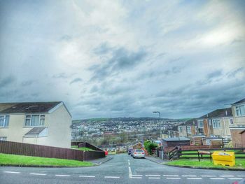 Road against cloudy sky