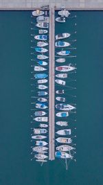 Directly above shot of boats moored in sea